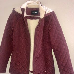 Maroon quilted jacket with fuzzy inside.